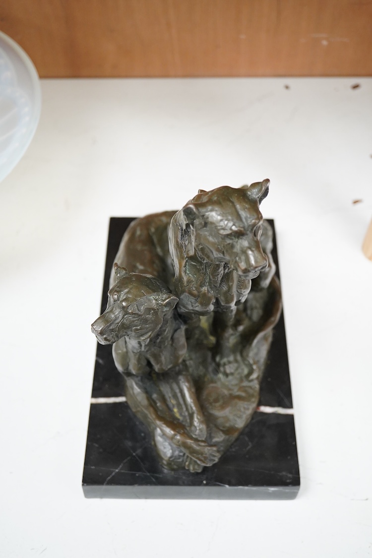 Miguel Fernando Lopez (Portuguese, contemporary): A painted bronze group of two lionesses